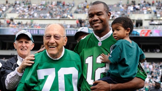 Al Wistert (No. 70) with Randall Cunningham in 2009 induction into Eagles Honor Roll